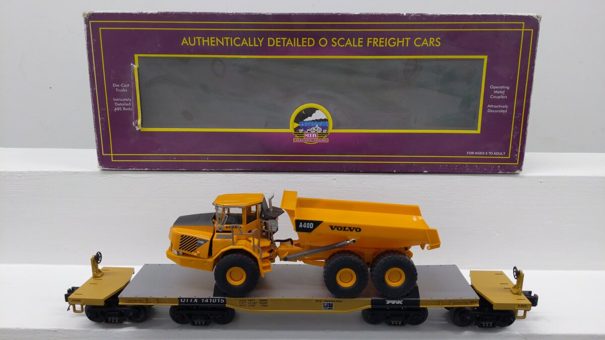 MTH 20-98500 O TTUX 47' Flat Car w/ Volvo A40D Hauler #141015 EX/Box