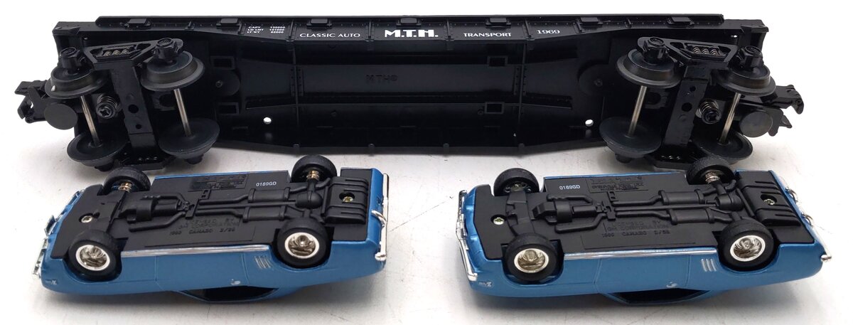 MTH 30-7634 O Gauge MTH Auto Transport Flatcar w/2 Ertl '69 Chevrolet Camaros EX/Box