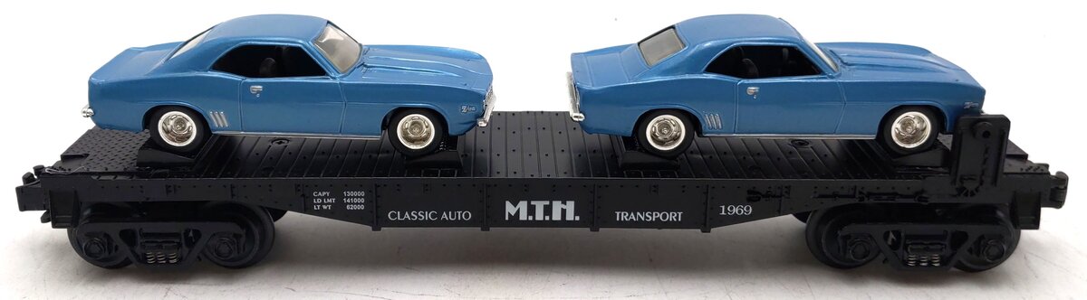 MTH 30-7634 O Gauge MTH Auto Transport Flatcar w/2 Ertl '69 Chevrolet Camaros EX/Box