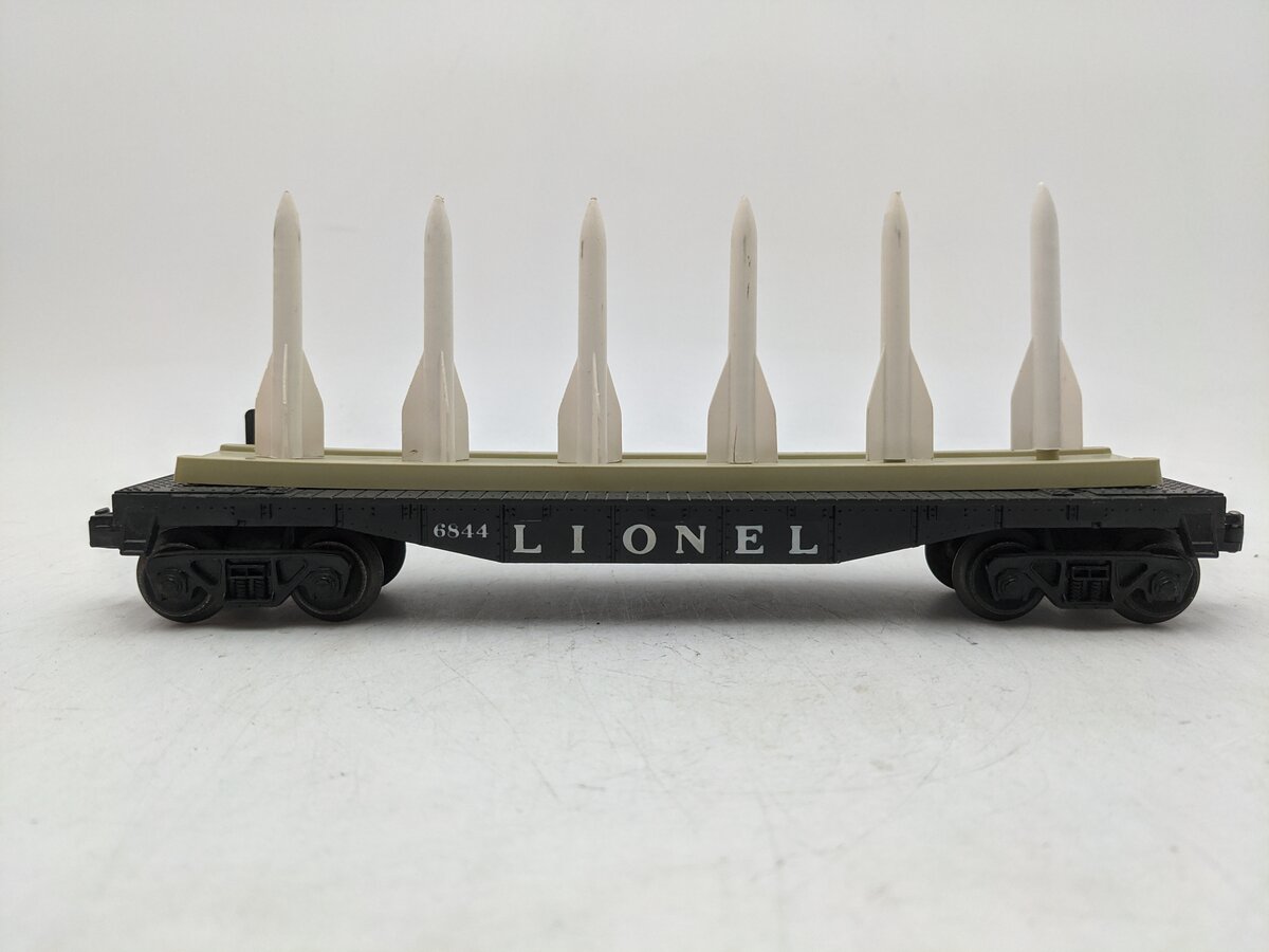 Lionel 6844 Vintage O Black Flatcar with 6 Small White Missiles EX/Box