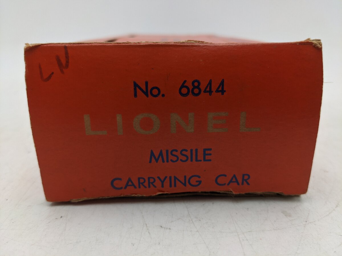 Lionel 6844 Vintage O Black Flatcar with 6 Small White Missiles EX/Box