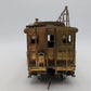 O Scale 2 Rail Brass Off Center Caboose (Undecorated)