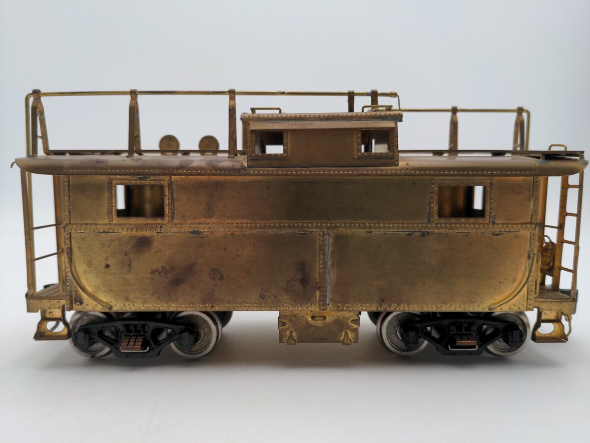 O Scale 2 Rail Brass Off Center Caboose (Undecorated)