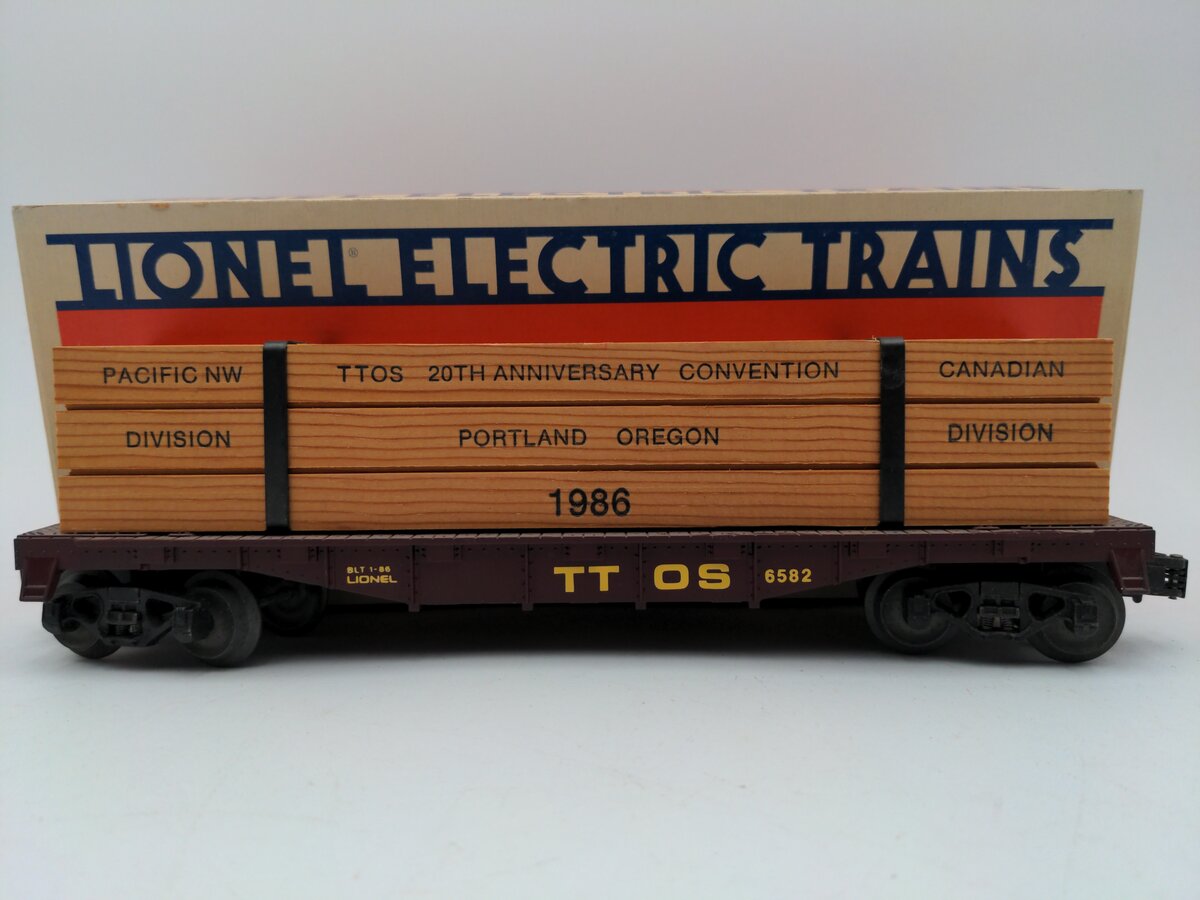 Lionel 6-6582 O Gauge TTOS-1986 Convention Flatcar w/Wood Load EX/Box