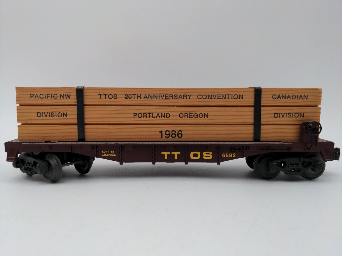 Lionel 6-6582 O Gauge TTOS-1986 Convention Flatcar w/Wood Load EX/Box