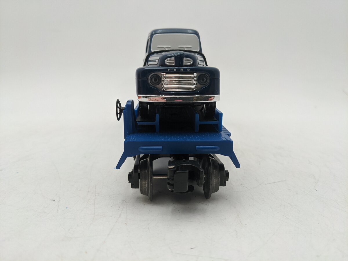 Lionel 6-16985 O Gauge Eastwood Automobilia Flatcar w/ Ford Panel Trucks #6424 EX/Box