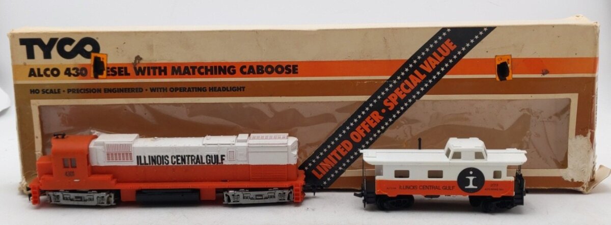 Tyco 250B HO Scale Illinois Central Diesel Locomotive with matching caboose EX/Box