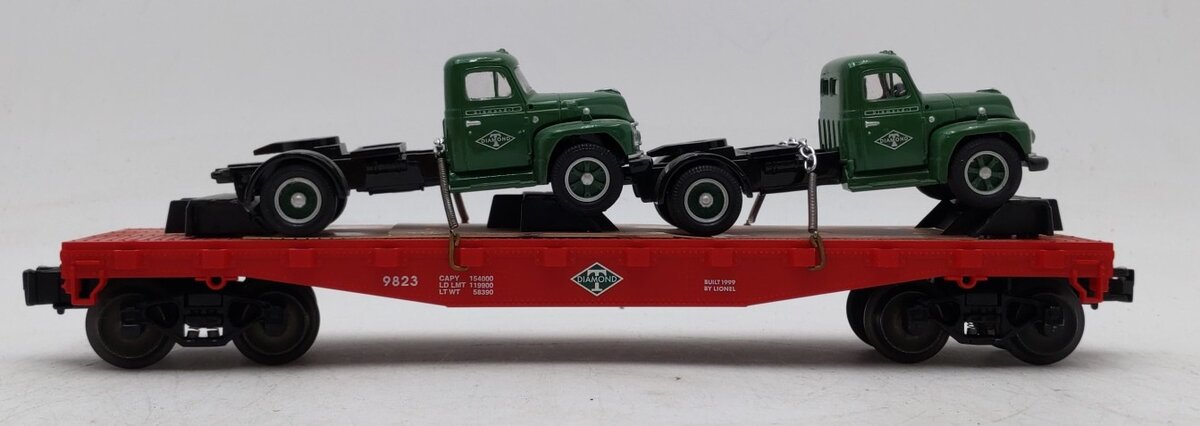 Lionel 6-17534 O Gauge Diamond T Flat Car w/Mack Trucks #9823 EX/Box