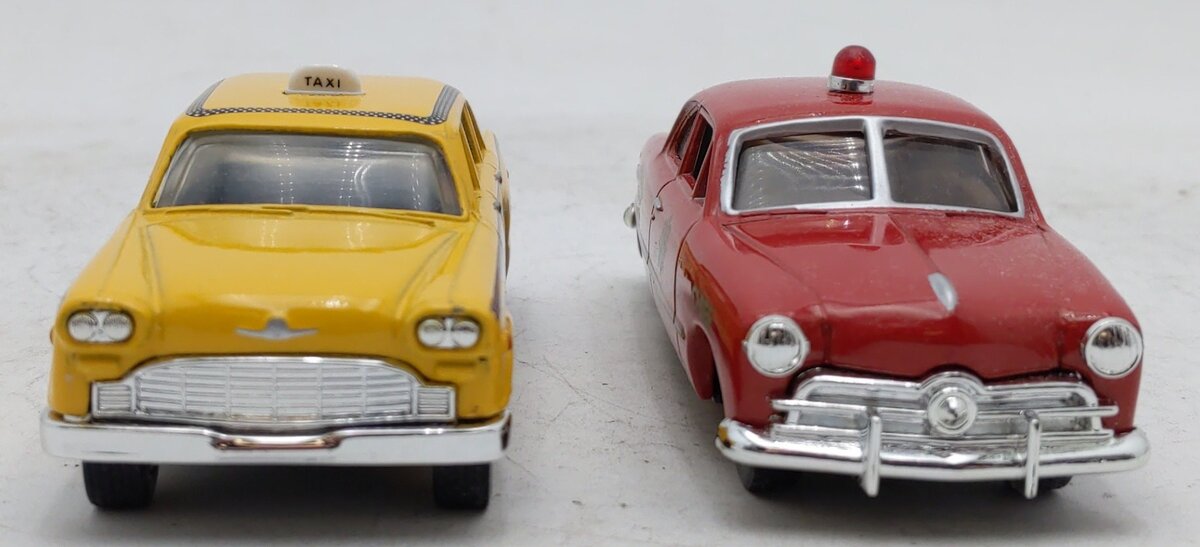 #H070 Eastwood Automobilia Pair of diecast Plastiville Taxi and Fire Chief EX/Box