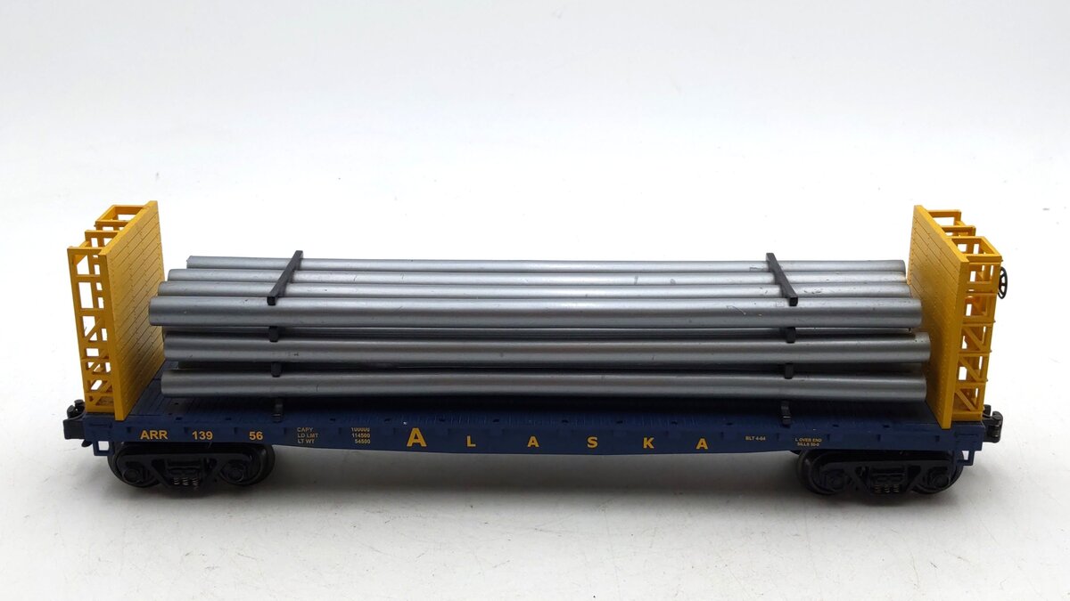 MTH 30-76088 O Gauge Alaska Bulkhead Flatcar with Pipe Load EX