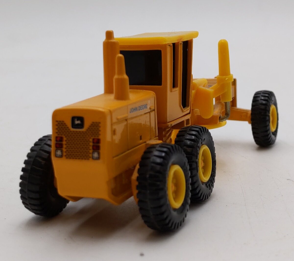 Ertl 1848 1:64 Mighty Movers Caterpillar Road Grader EX/Box