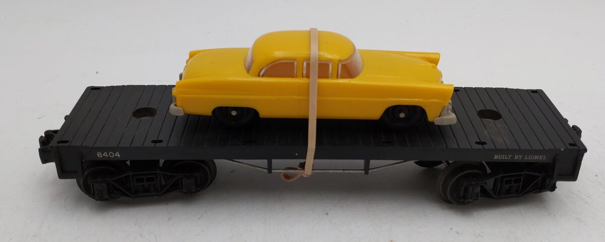 Lionel 6404 Vintage O Black Flatcar w/Dark Yellow Auto - RARE VG
