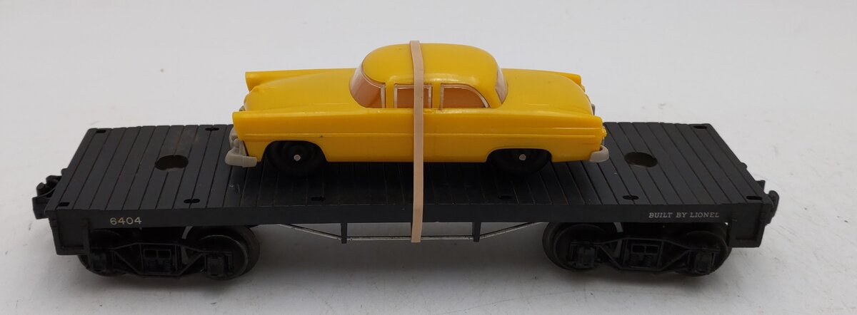 Lionel 6404 Vintage O Black Flatcar w/Dark Yellow Auto - RARE VG