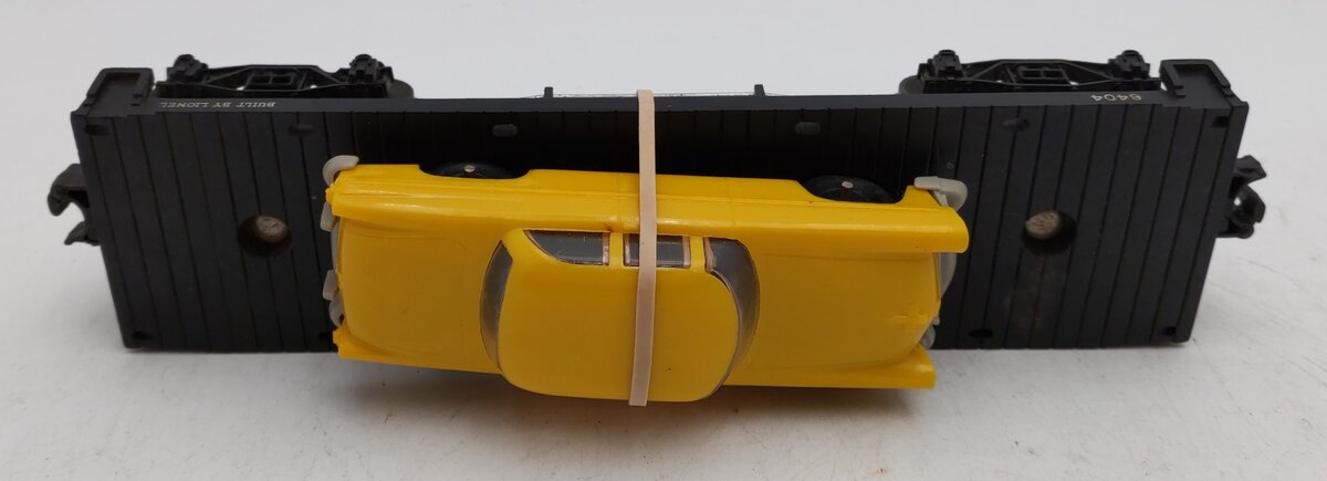 Lionel 6404 Vintage O Black Flatcar w/Dark Yellow Auto - RARE VG