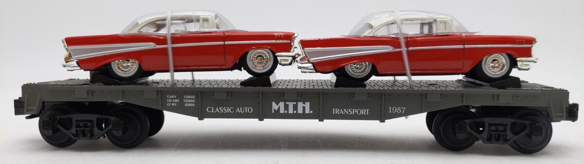 MTH 30-7610 O Gauge MTH Lines Flat Car with 2 Red Ertl '57 Chevys LN/Box