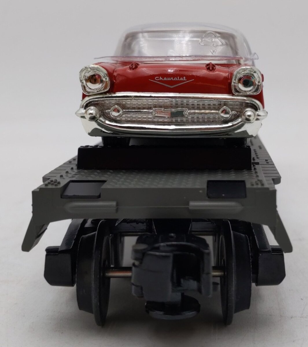 MTH 30-7610 O Gauge MTH Lines Flat Car with 2 Red Ertl '57 Chevys LN/Box