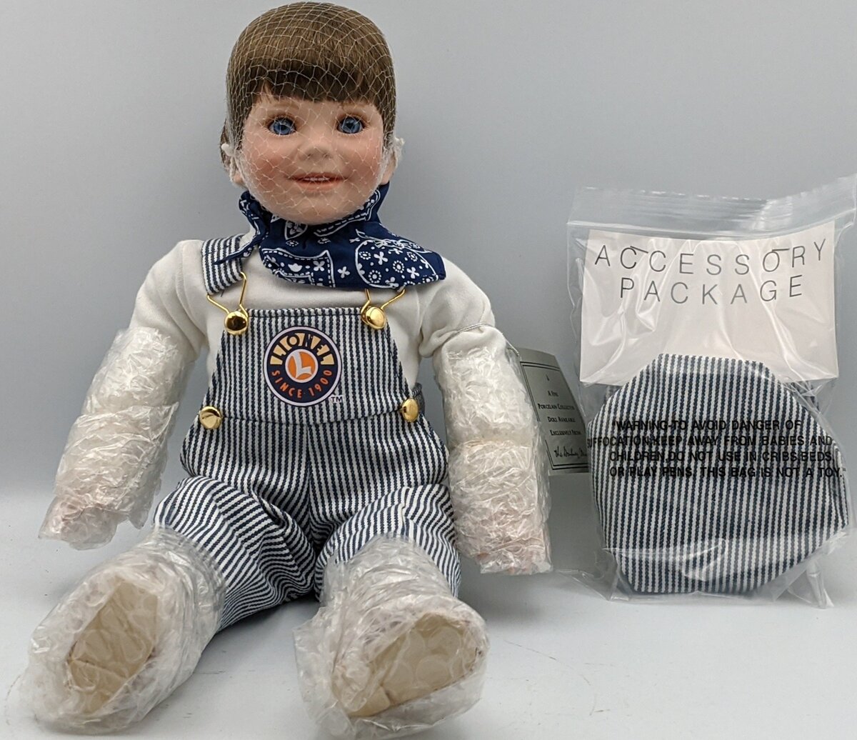 Lionel 418-001 Tyler the Porcelain Lionel Collector Doll NIB