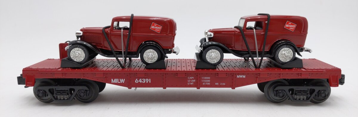 MTH 30-8303 O Gauge Milwaukee Road Die-Cast Flatcar w/Ertl '32 Panel Vans LN/Box