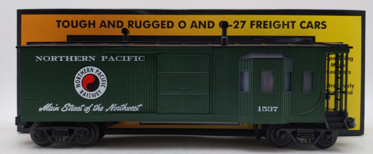 MTH 30-7725 O Gauge Northern Pacific Work Caboose with Bay Window LN/Box