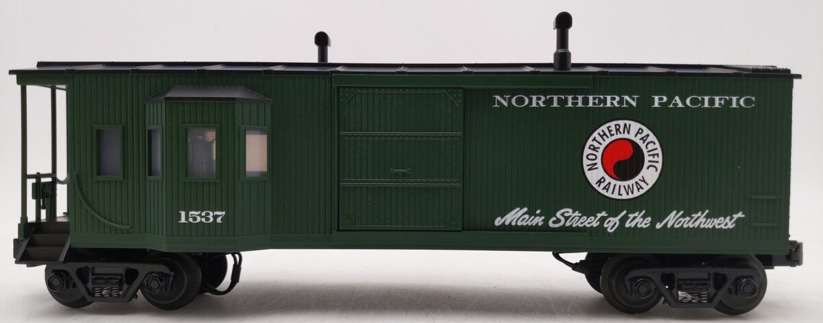 MTH 30-7725 O Gauge Northern Pacific Work Caboose with Bay Window LN/Box
