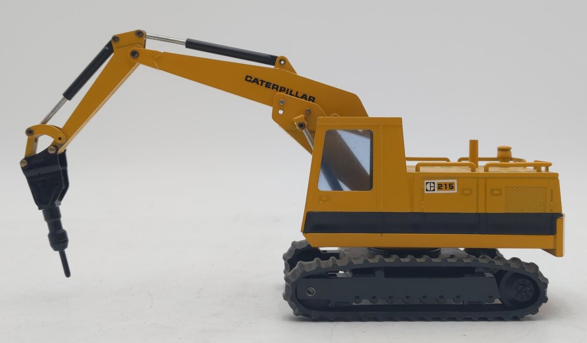NZG 190 1:50 Caterpillar 215 Hydraulic Excavator with Hammer EX/Box