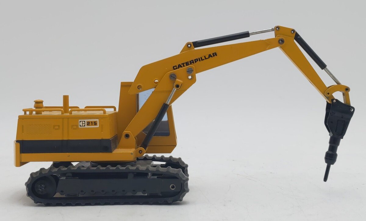 NZG 190 1:50 Caterpillar 215 Hydraulic Excavator with Hammer EX/Box