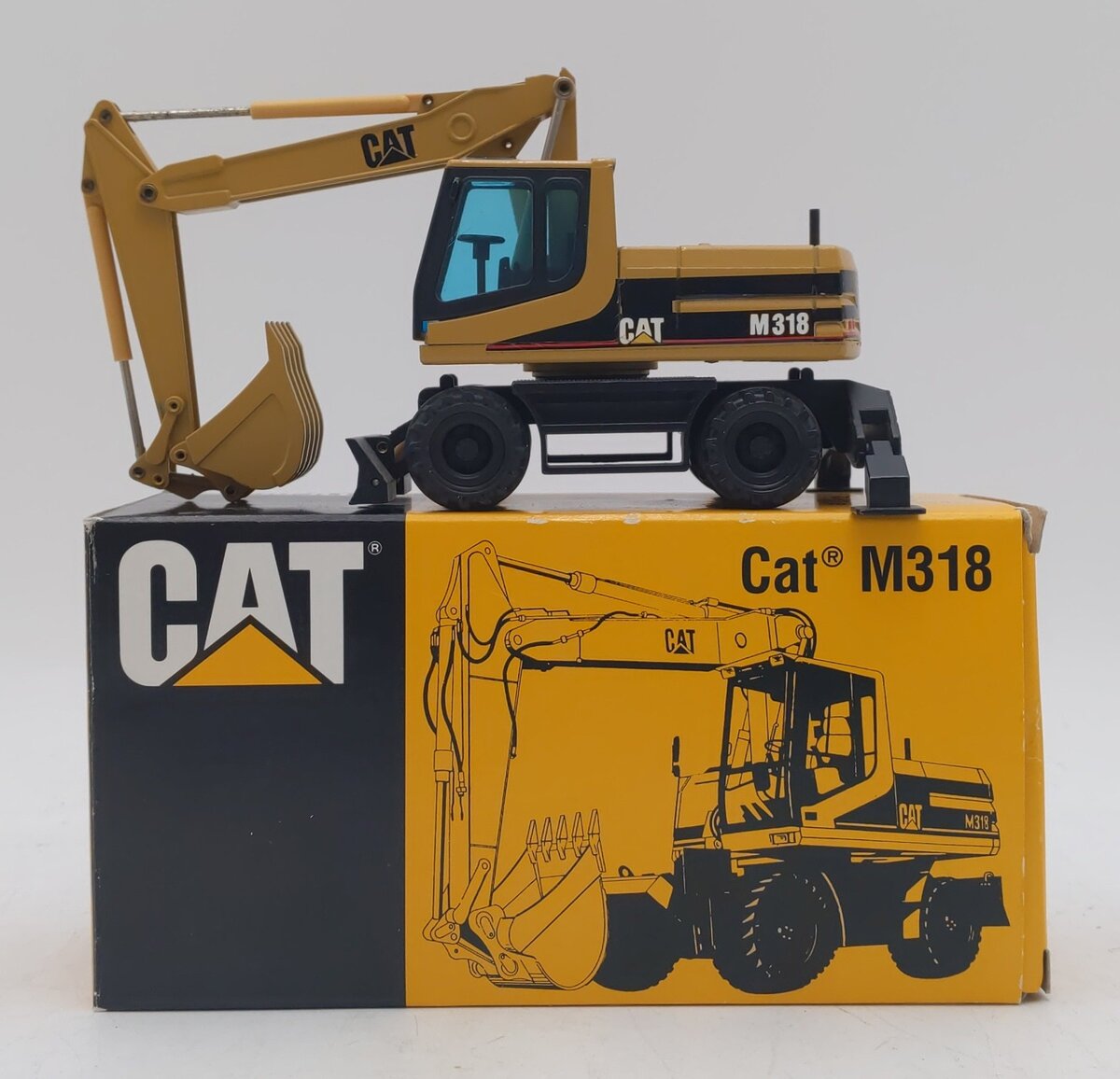 NZG 405 1:50 Caterpillar M318 Wheeled Excavator EX/Box