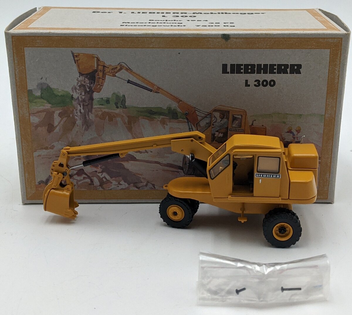 NZG 538 1:50 Liebherr L300 3-Wheel Excavator Yellow NIB