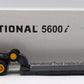 Conrad 0012 1:50 International 5600i Komatsu Truck w/ Talbert Lowboy Trailer NIB