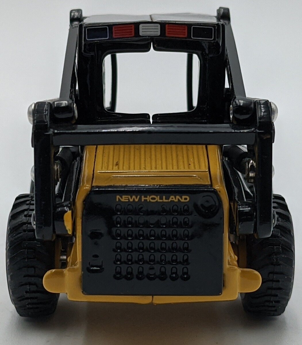 Ertl 358 1:32 Diecast New Holland LX 665 Skid Steer Loader NIB