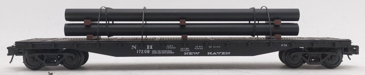 Atlas 933-1 O Gauge New Haven 52'6" Flatcar w/Pipe Load #17208 (3 Rail) EX/Box
