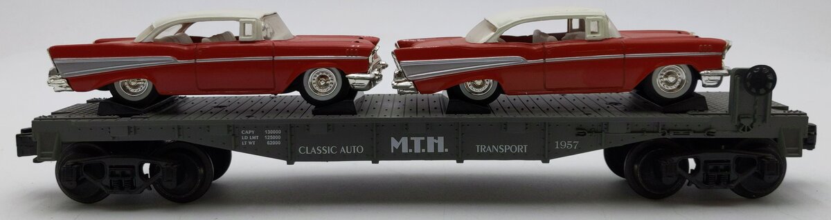 MTH 30-7610 O Gauge MTH Lines Flat Car with 2 Red Ertl '57 Chevys EX/Box