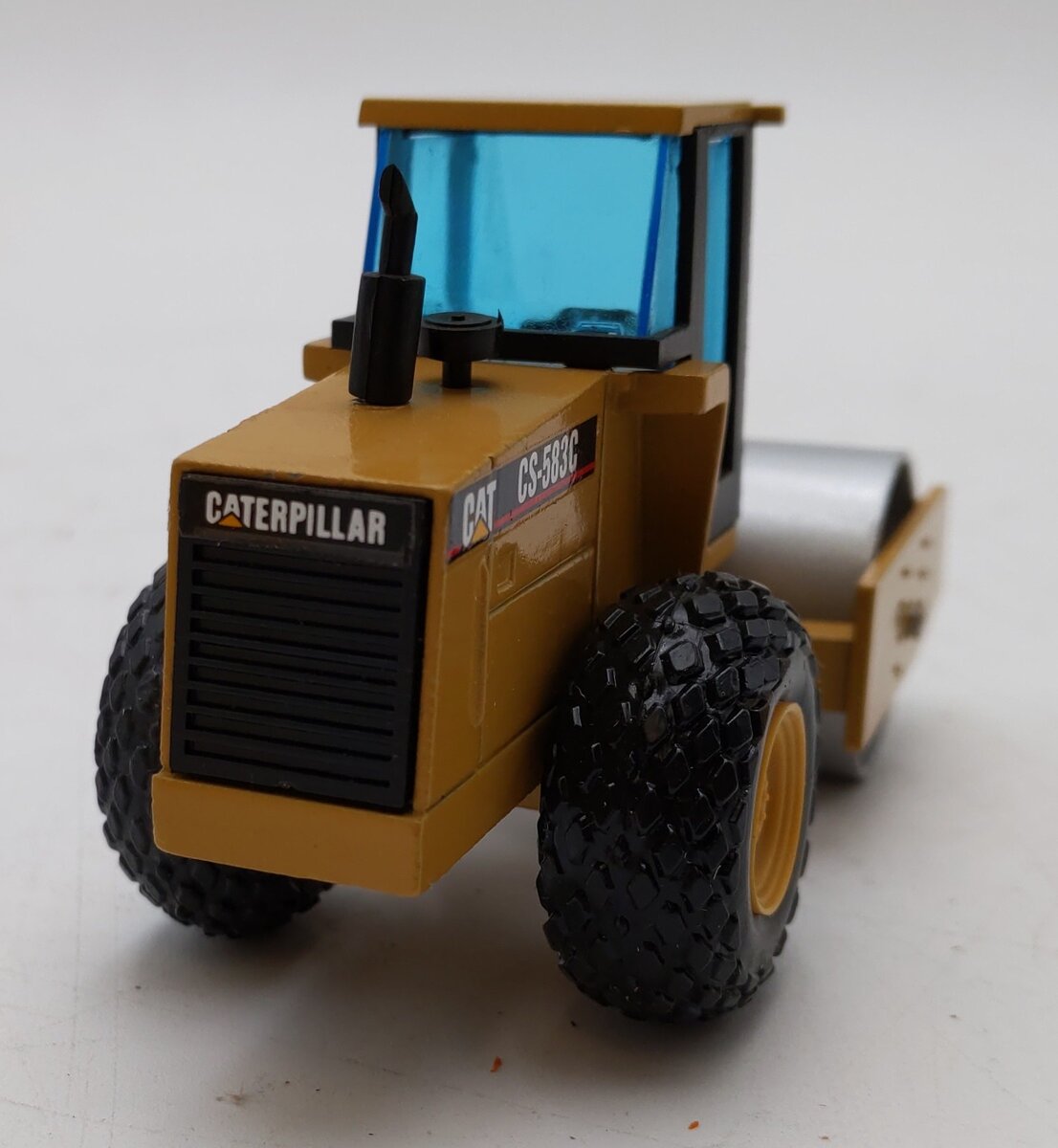 NZG 402 1:50 Caterpillar CS-583C Vibratory Soil Compactor LN/Box