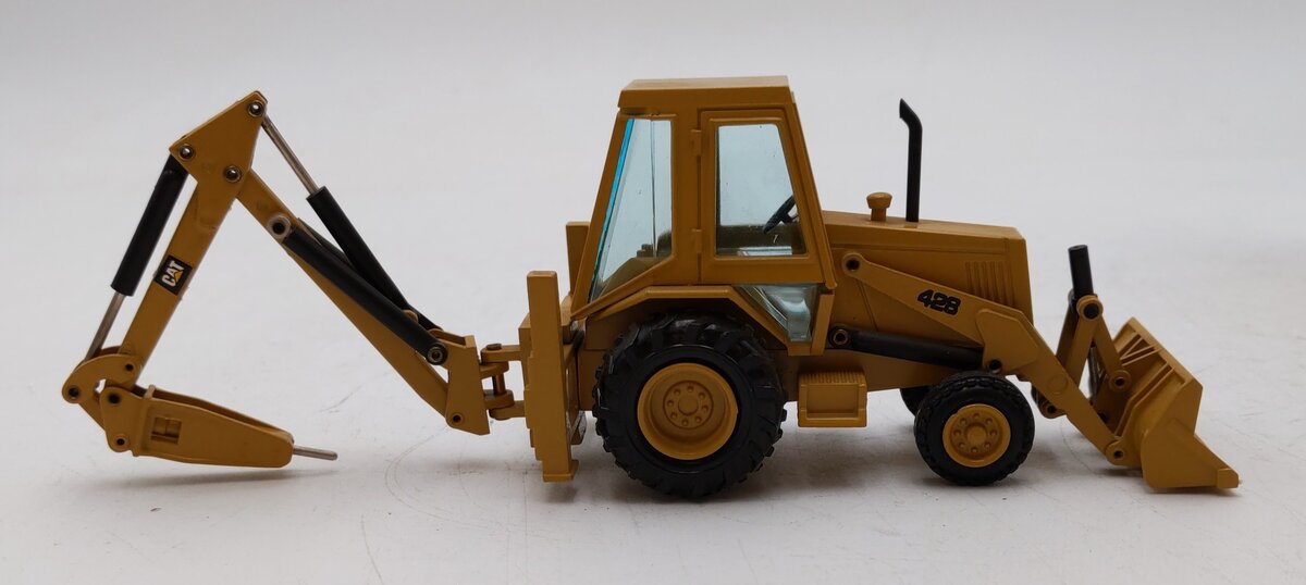 NZG JB479 Modelle 1:50 Scale Caterpillar 428 Backhoe Loader w/ Hydraulic Hammer LN/Box