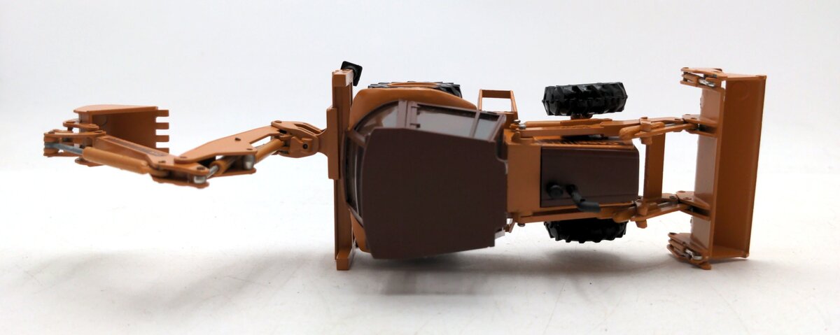 Conrad 2934 1:35 Case Loader/Backhoe With 4 Wheel Drive And Case 4-In-1 Bucket LN/Box