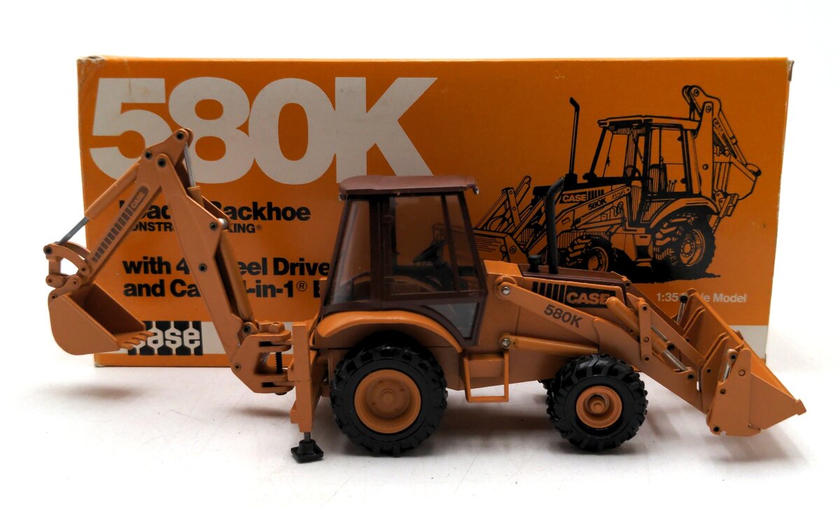 Conrad 2934 1:35 Case Loader/Backhoe With 4 Wheel Drive And Case 4-In-1 Bucket LN/Box