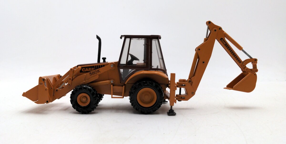 Conrad 2934 1:35 Case Loader/Backhoe With 4 Wheel Drive And Case 4-In-1 Bucket LN/Box
