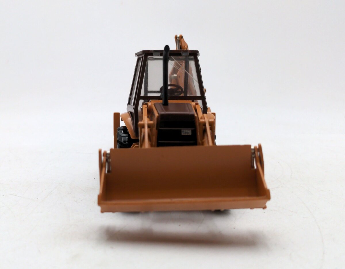 Conrad 2934 1:35 Case Loader/Backhoe With 4 Wheel Drive And Case 4-In-1 Bucket LN/Box