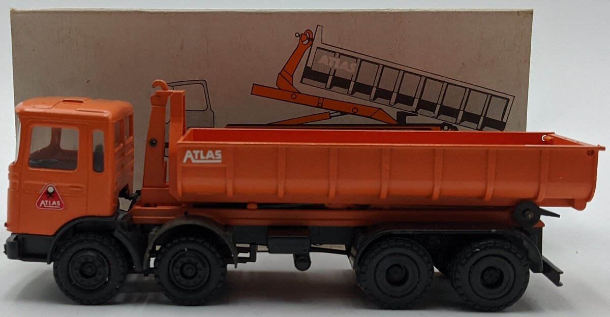 Conrad 3167 1:50 MAN Atlas 4-Axle Roll-Off Dump Truck Orange
