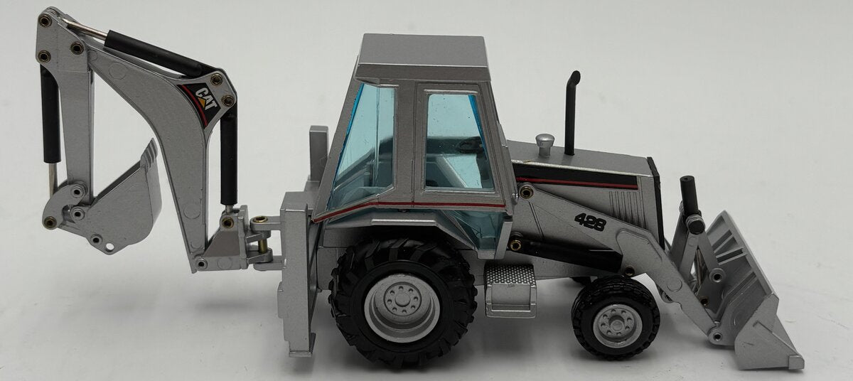 NZG 2851 1:50 Caterpillar 428 Backhoe Loader - Silver Edition LN/Box