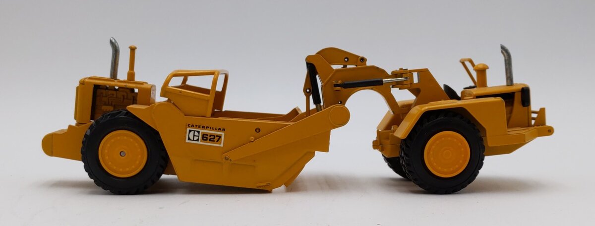 NZG 1:50 Scale #126 Caterpillar 627 Wheel Scraper O/C LN