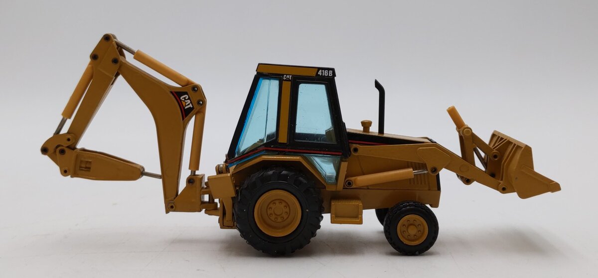 NZG Modelle 1:50 Scale Caterpillar 416B Wheel Loader W/ Hammer No.265 LN