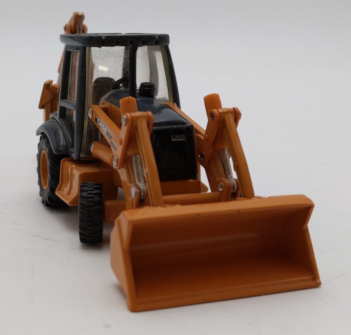 ERTL 14704 1:50 Scale Case 580M Backhoe Loader LN