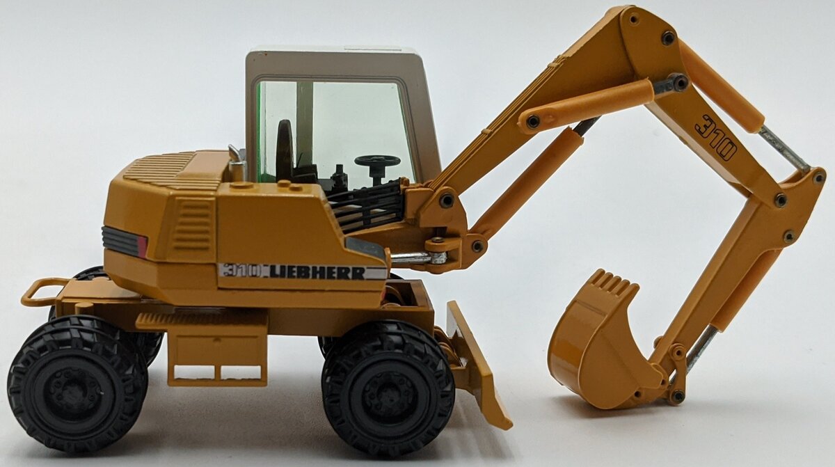Conrad 2833 1:50 Scale Liebherr A 310 Wheel Excavator Die-Cast Model NIB