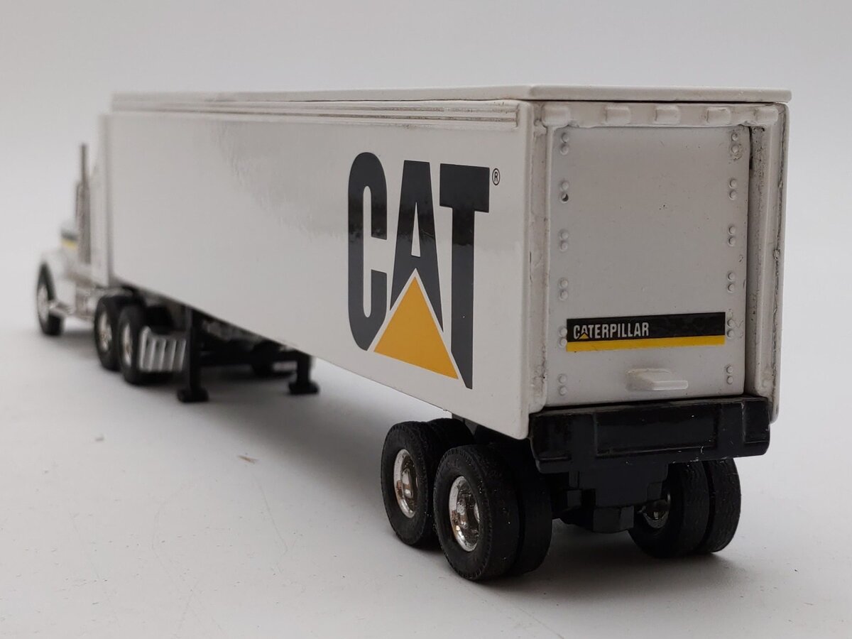 Ertl 7712 1:64 Die Cast Caterpillar Cab w/Trailer LN/Box