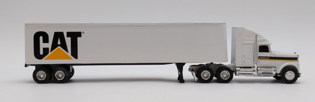 Ertl 7712 1:64 Die Cast Caterpillar Cab w/Trailer LN/Box