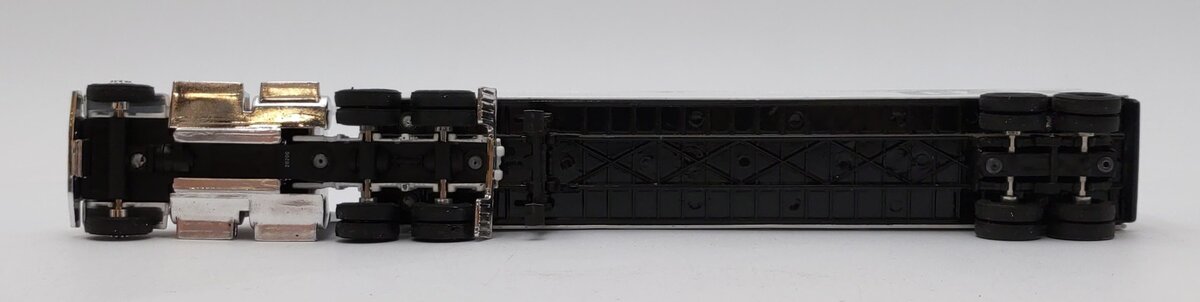 Ertl 7712 1:64 Die Cast Caterpillar Cab w/Trailer LN/Box
