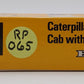 Ertl 7712 1:64 Die Cast Caterpillar Cab w/Trailer LN/Box