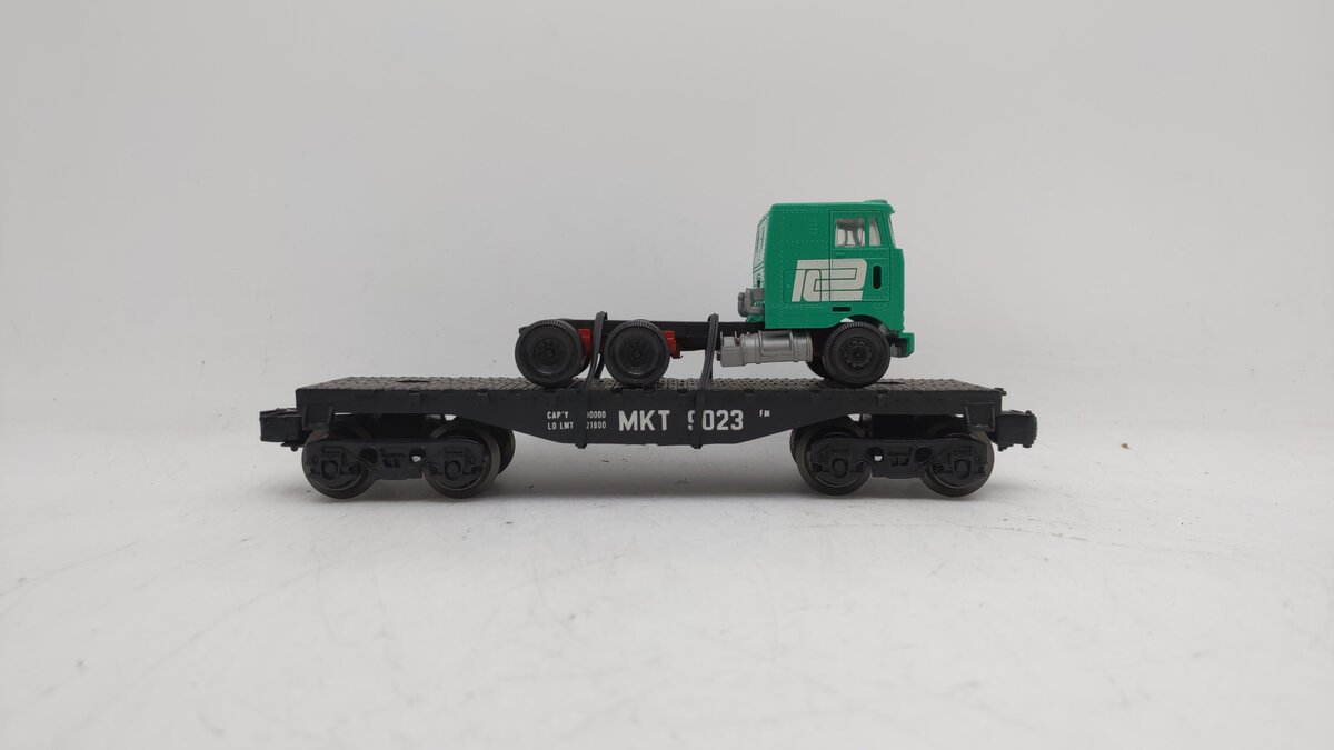 Lionel 6-9023 MKT O Flatcar w/ Green Truck EX