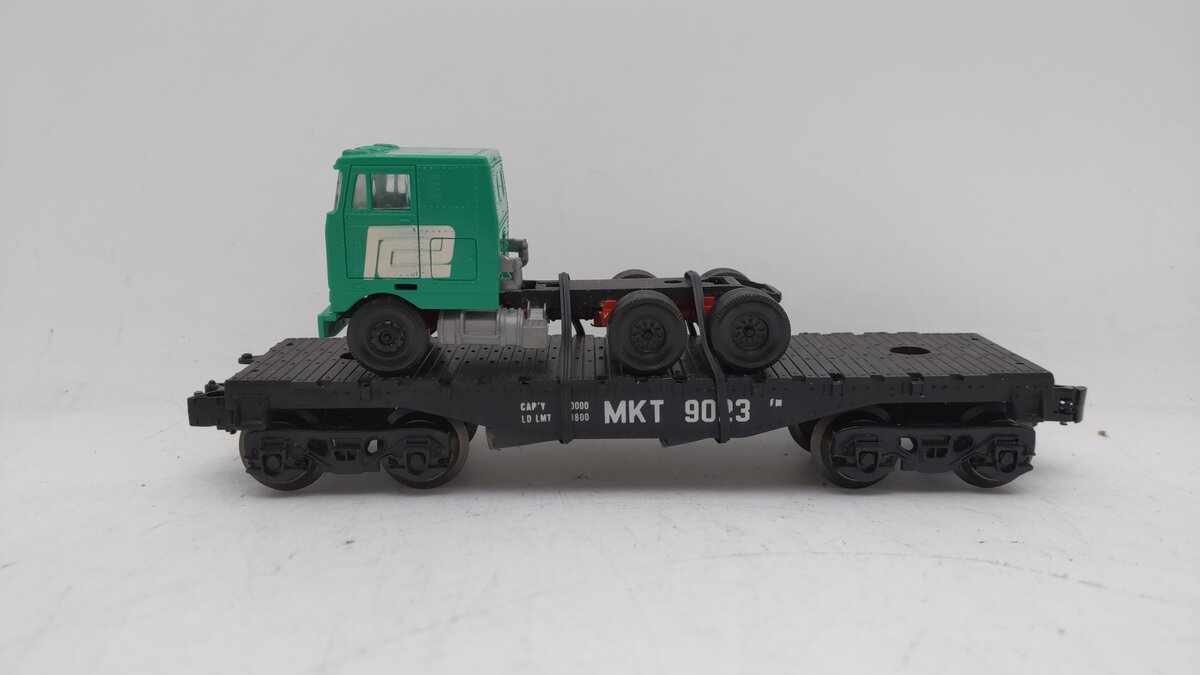 Lionel 6-9023 MKT O Flatcar w/ Green Truck EX